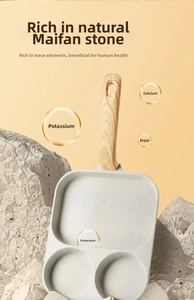 Detailed view of 3-section maifan stone non-stick breakfast pan with wood-grain handle