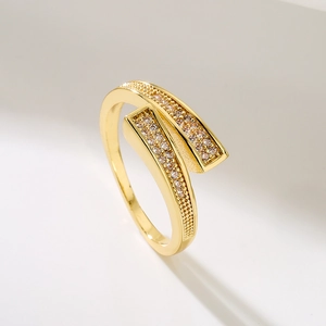 Elegant gold plated copper ring with double row zircon in modern irregular cross design