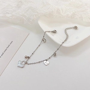 Waterproof stainless steel heart bracelet with shell texture inlay and Love charm