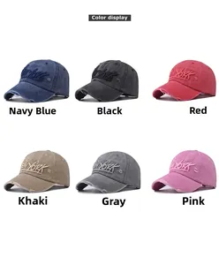 Detailed view of six vintage washed cotton New York embroidered baseball caps in various colors