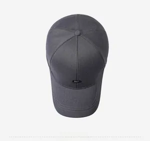Top view of dark grey baseball cap showing six-panel structure and SP logo detail