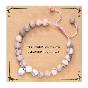 Pink zebra stone heart bracelet for niece on a sentimental gift card display