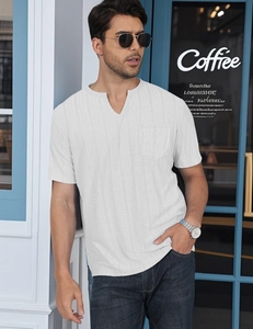 Outdoor shot of men's white waffle knit t-shirt with v-neck and pocket detail