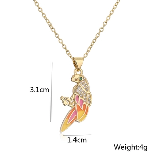 Detailed view of 18K gold-plated parrot pendant necklace with enamel and zircon stones