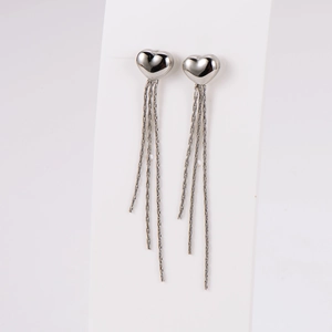Exquisite silver heart stud earrings with long tassel chains on a white jewelry card
