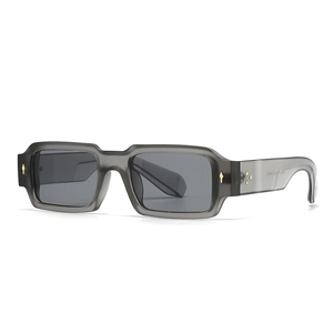 Retro square sunglasses with gray translucent frames and gold diamond rivets detail