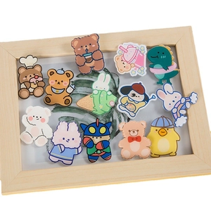 Cute acrylic cartoon badge set featuring bear and rabbit pins in a wooden frame
