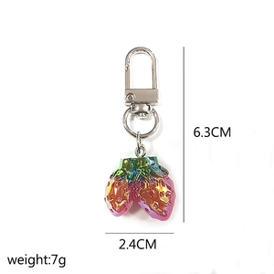 Mini strawberry keychain details with iridescent finish and size markings 6.3cm long