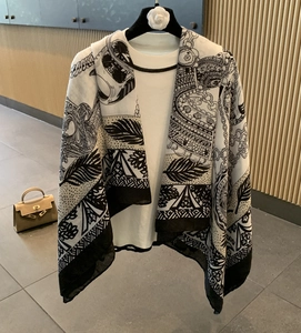Retro style square scarf with black and white leaf and chain patterns on a white t-shirt