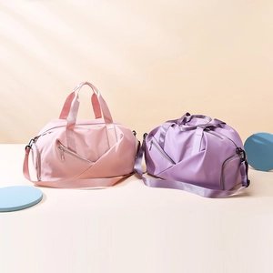 Pink and purple waterproof nylon travel bags with shoulder straps and zip compartments