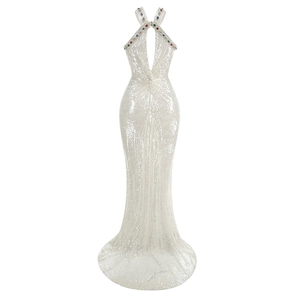 Detail of white sequin gown showing halter neck with colorful gemstone embellishments