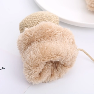 Close-up of beige knitted toddler gloves with double-layer thick fleece and hanging rope