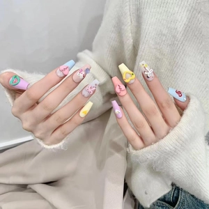 Handmade long ballerina press-on nails with colorful macaron 3D hearts and bows