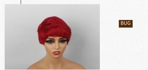 Detail of vivid red pixie cut human hair wig showing layered texture on a model head