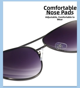 Detail view of adjustable silicone nose pads on black metal sunglasses with purple lenses