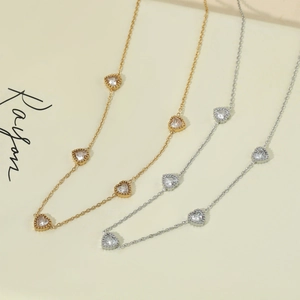 Sparkling heart pendant necklaces in gold and silver finish with fine chain for women