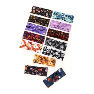 Halloween yoga headbands with skull, pumpkin and spider web patterns in a 12-piece set