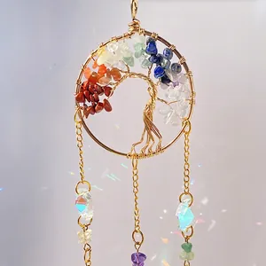 Tree of Life suncatcher with colorful chakra stones and hanging crystal prisms for garden
