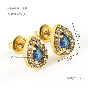Detail of 11mm blue zircon teardrop earrings in 18K gold plated stainless steel