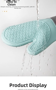 Waterproof silicone oven mitt with anti-slip texture being rinsed under water