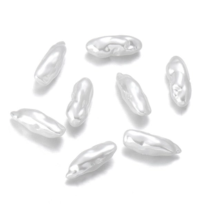 Close-up of irregular baroque white ABS imitation pearls for DIY jewelry making