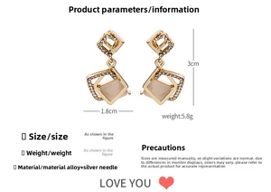 Detailed size specifications of gold diamond earrings with cat eye stone and silver needles