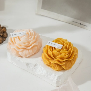Peony flower scented candle set in pink and yellow with realistic petal textures