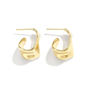 Minimalist gold wavy geometric stud earrings with polished metallic finish and modern twist