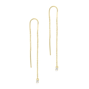 Macro shot of long gold tassel ear threader with sparkling round-cut cubic zirconia drop