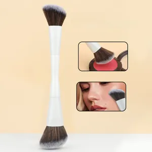 Detail of dual-ended makeup brush showing soft angled bristles and precision application