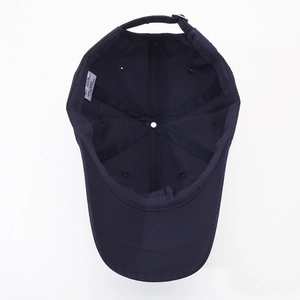 Internal structure of navy blue cotton baseball cap with adjustable metal strap and tag