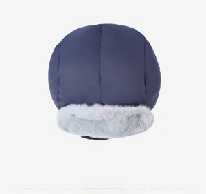 Top view of navy winter trapper hat with windproof fabric and soft grey faux fur lining