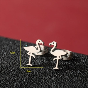 Stainless steel flamingo stud earrings in silver finish, size 12mm by 8mm on black surface