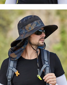 Detail of outdoor sun hat featuring camouflage print, neck flap and breathable mesh panel
