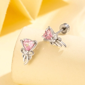 Titanium steel stud earrings with pink heart gemstones and delicate silver bow designs