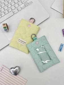 Quilted heart card holders in yellow and mint green with clear windows and metal rings