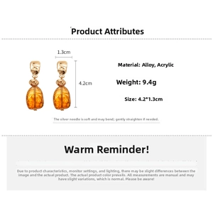 Detail view of Maillard resin drop earrings with 4.2x1.3cm size and weight specs