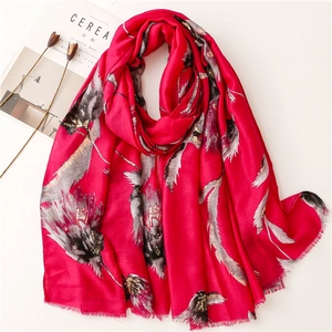 Elegant red cotton linen scarf with gold foil feather prints and fringe edges for women