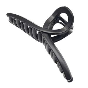 Classic matte black hair claw clip with cross-teeth design and strong metal spring
