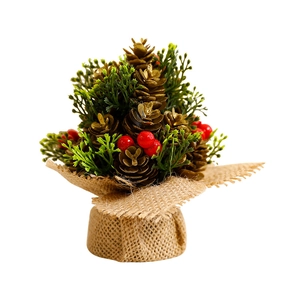 Mini Christmas tree with pine cones red berries and burlap base for table decoration