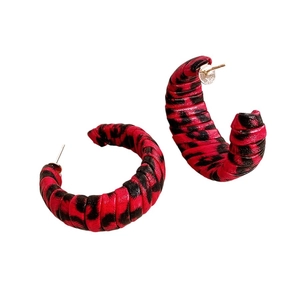 Vintage C-shaped round earrings featuring red and black leopard print leather texture
