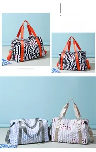 Detail of large travel tote bags with letter prints, sturdy handles and adjustable straps
