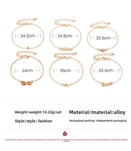 Detailansicht des 6-teiligen goldenen Armband-Sets mit Herz und Unendlichkeitszeichen