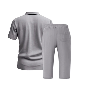 Back view of gray men's two-piece linen set showing short-sleeve Polo shirt and cropped pants