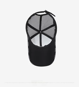 Detail view of breathable black mesh baseball cap interior with moisture-wicking band