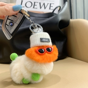 Cute plush caterpillar keychain in cream faux fur with sunglasses and knitted hat