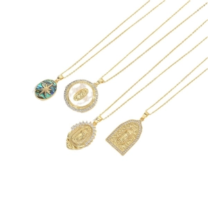 Golden Virgin Mary pendant necklace set with rhinestone and shell inlay detail