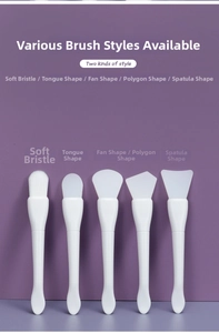 Detail of five dual-ended face mask brushes with different silicone and soft bristle heads