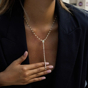 Elegant 18K gold-plated Y-shaped necklace with rectangular zircon stones on a model
