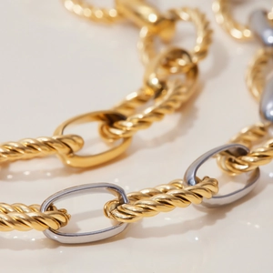 Two-tone gold and silver twisted rope chain bracelet in minimalist stainless steel